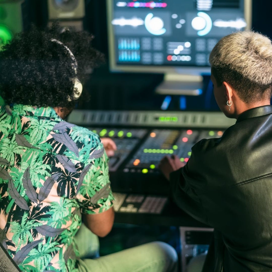 A Shazacin team member recording audio description in a studio